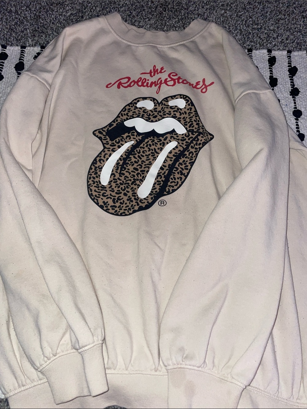 the Rolling Stones Cream Sweatshirt with Leopard Tongue Graphic